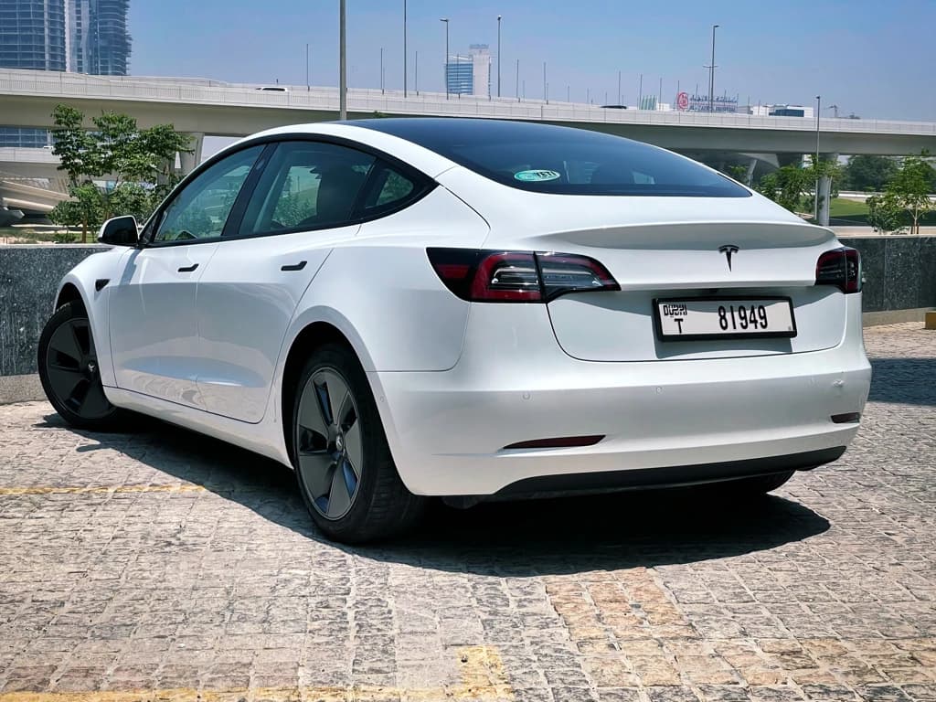 Tesla Model 3 2021 White rear side