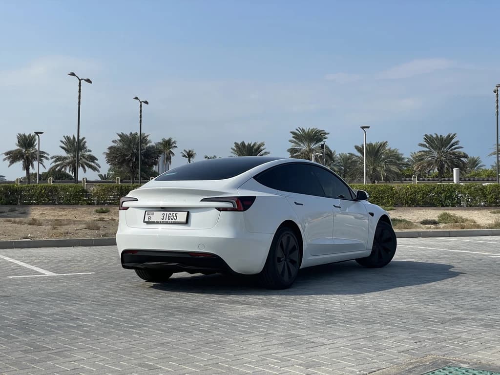 Tesla Model 3 2024 White rear side