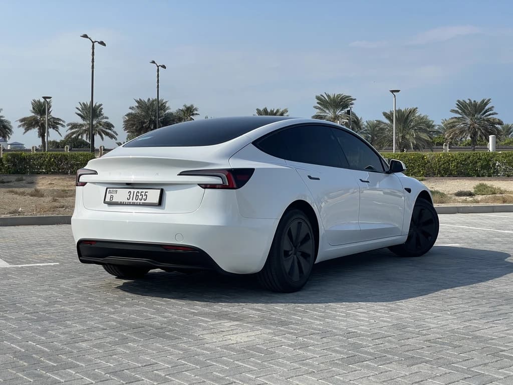 Tesla Model 3 2024 White rear side