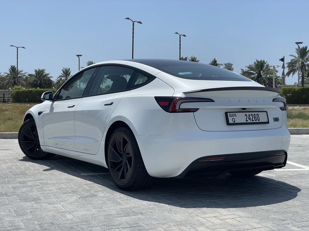 Tesla Model 3 Performance 2024 White rear side