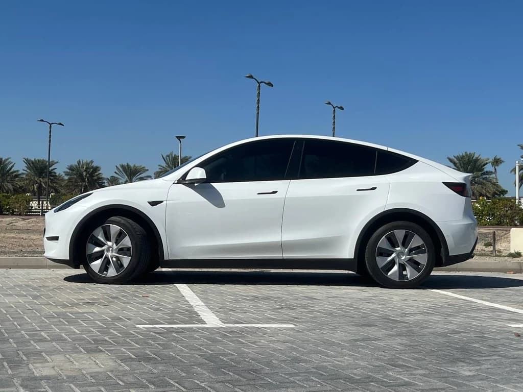 Tesla Model Y 2022 White side left